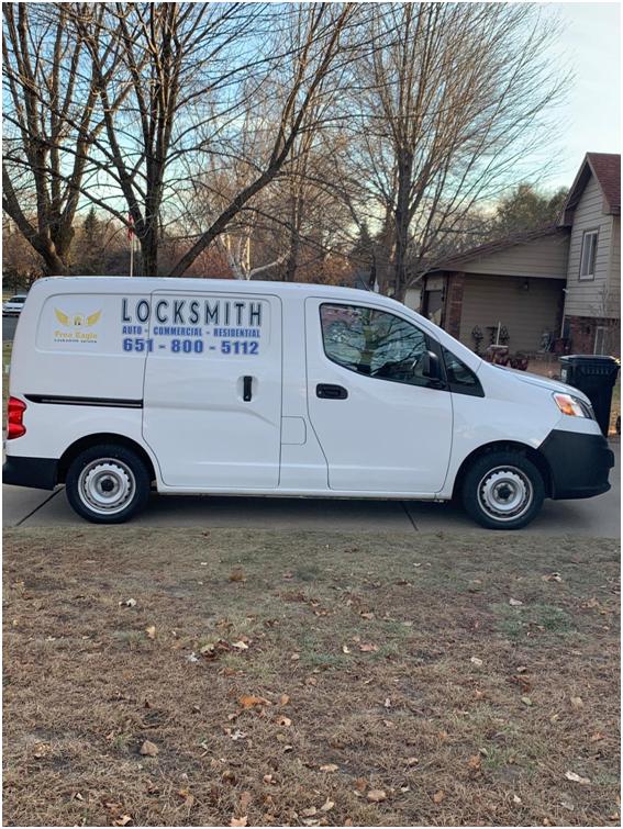 Free Eagle Locksmith service van parked outside a residential property